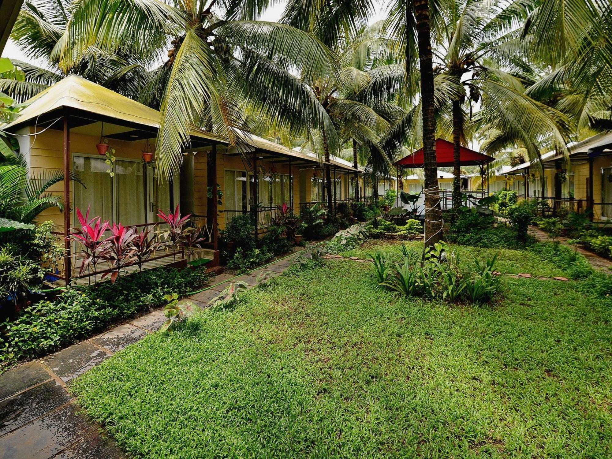 Collection O Retreat Morjim Resort Bagian luar foto