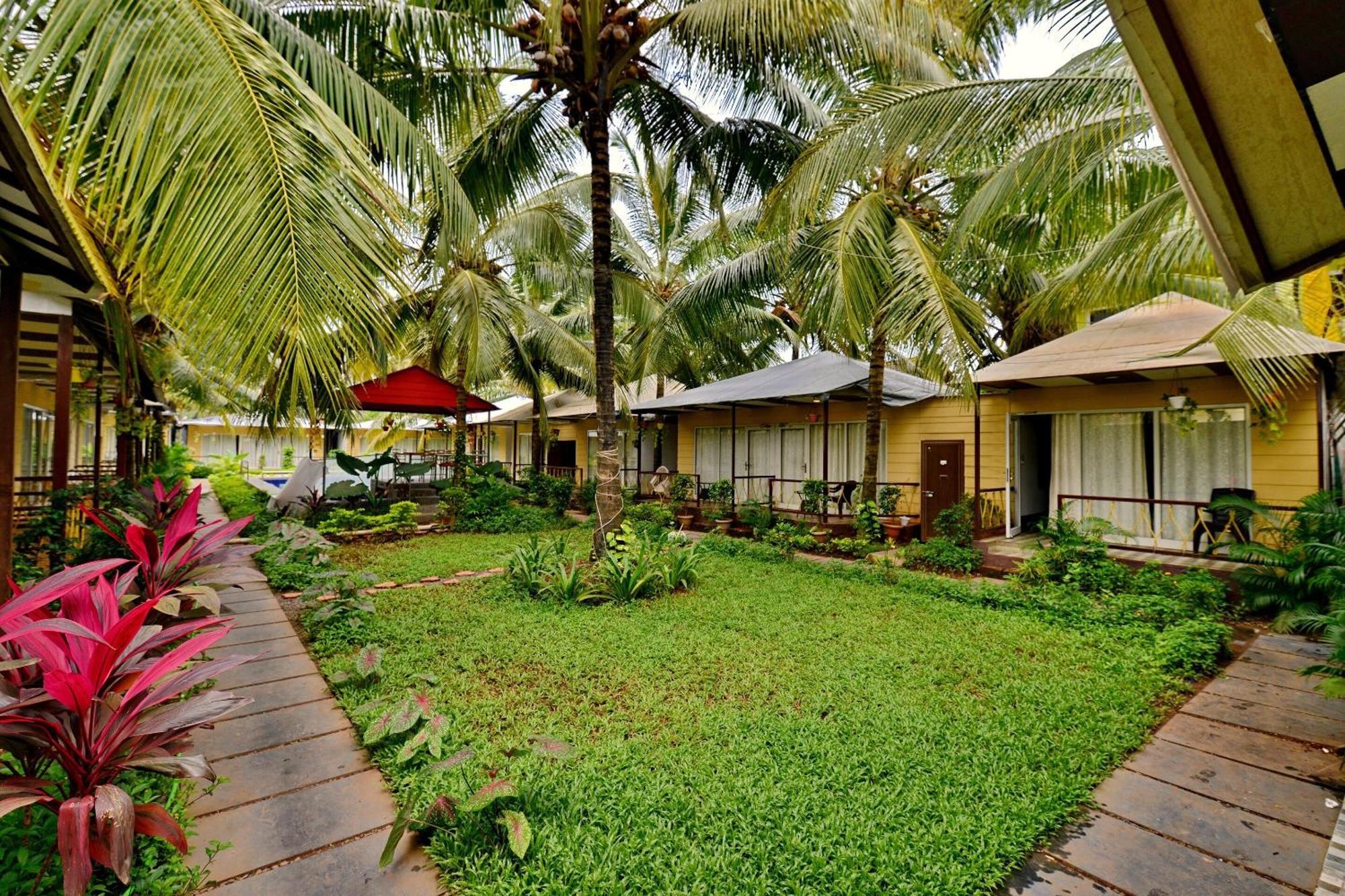 Collection O Retreat Morjim Resort Bagian luar foto