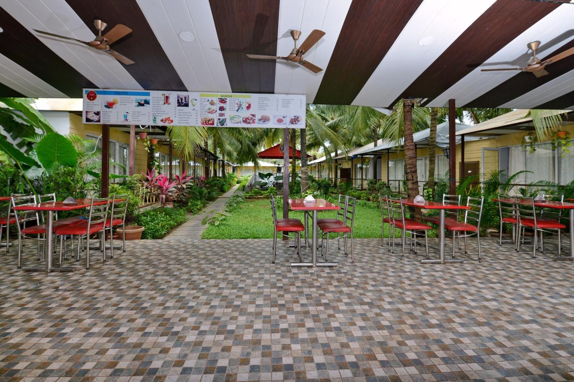 Collection O Retreat Morjim Resort Bagian luar foto