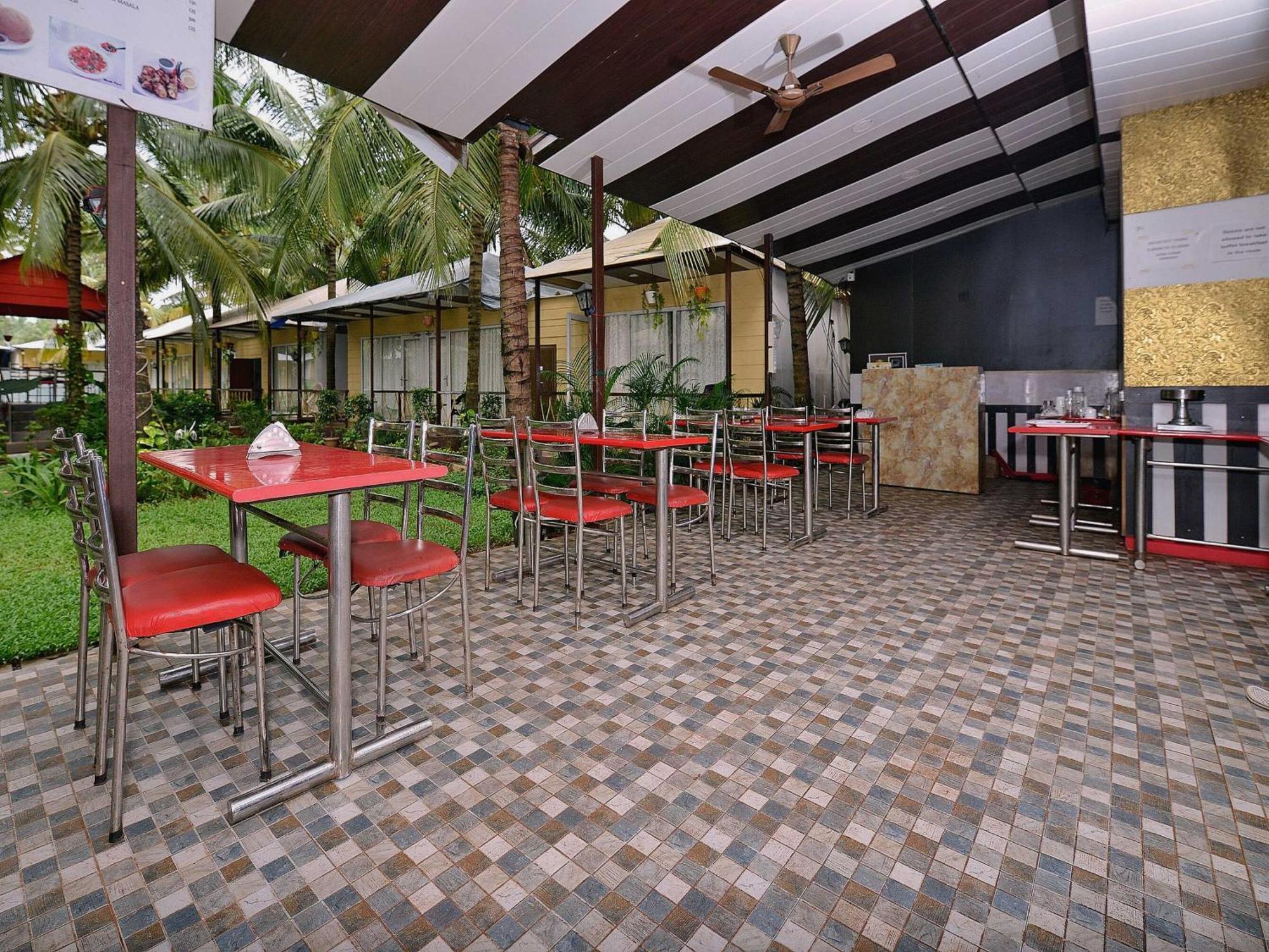 Collection O Retreat Morjim Resort Bagian luar foto