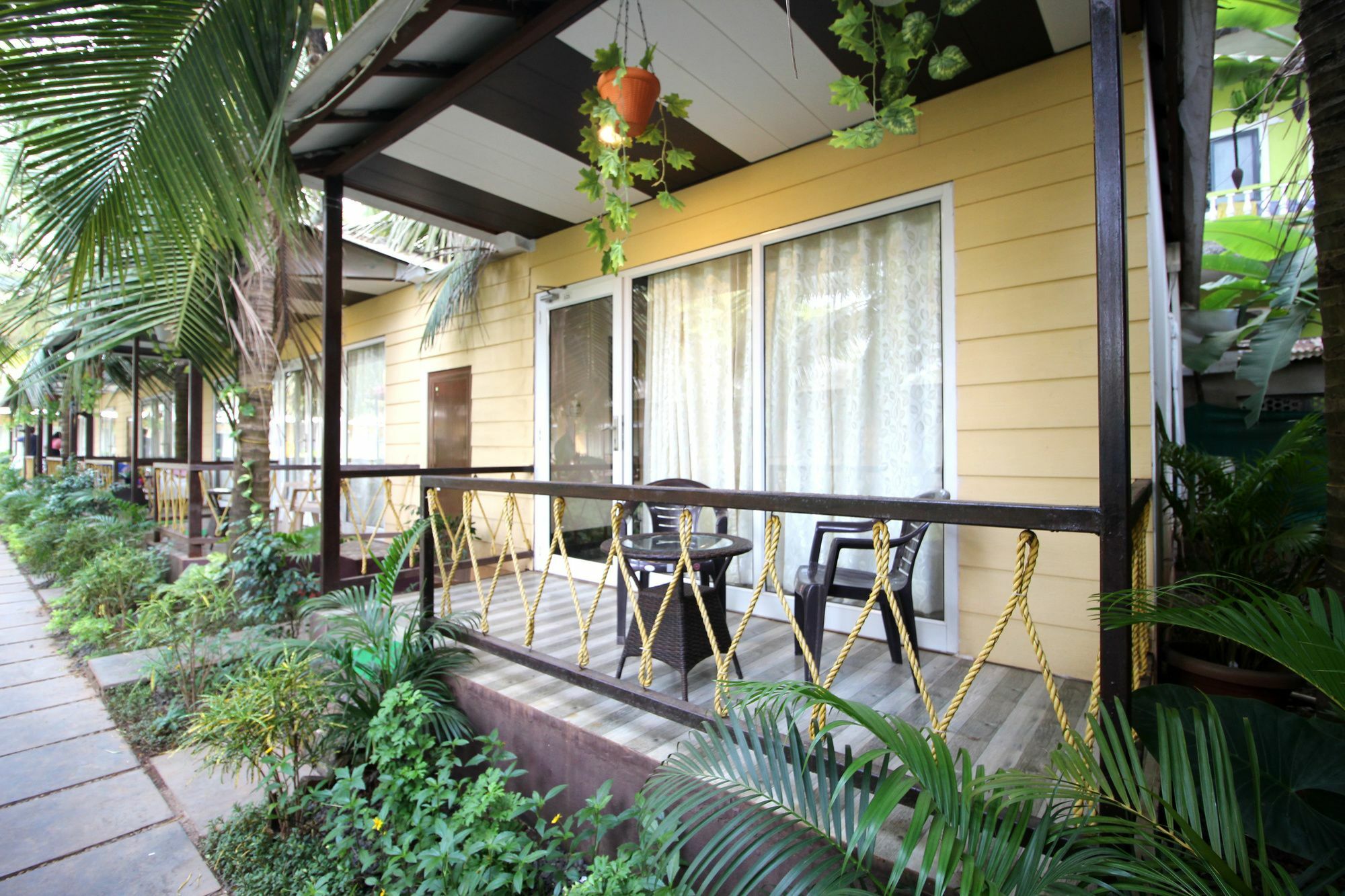 Collection O Retreat Morjim Resort Bagian luar foto